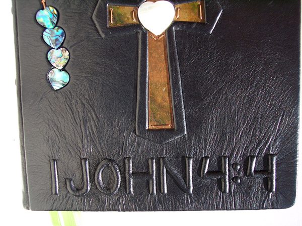 1 John 4:4 leather embossed verse on Bible cover