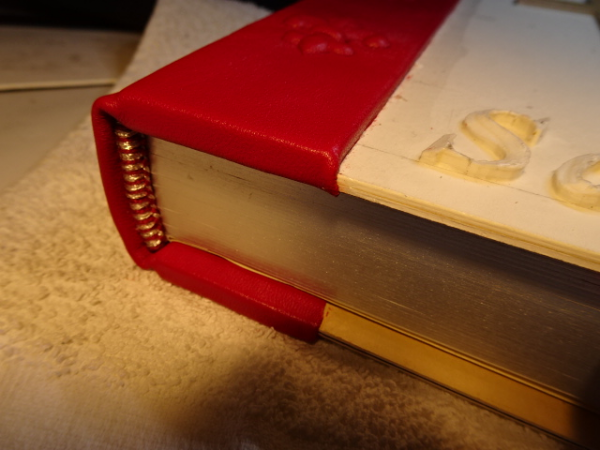 In-Progress image - Headband sewn onto the end of Bible Spine