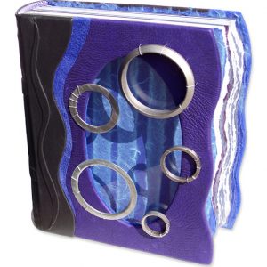 oval stained glass window blue and purple leather photo album with five steel rings and wavy book edge