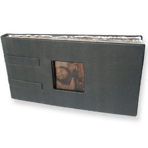 Black Leather Photo Book with Window cut through the front cover to show first photo
