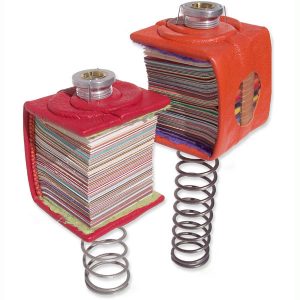 Miniature leatherbound Bouncing Books on truck springs