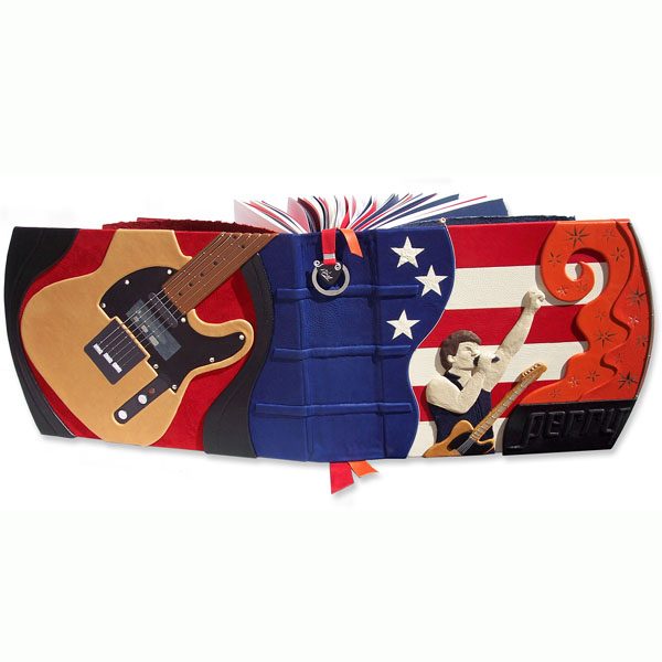 Bruce Springsteen Scrapbook with hand carved and leather embossing, Telecaster guitar on back cover, American flag