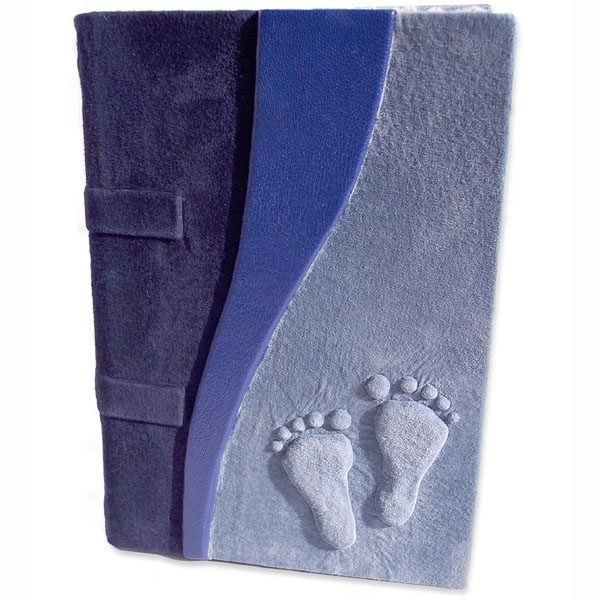blue suede baby footprints embossed on leather book cover with two dark blue accents