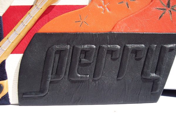 Carved Embossed name Perry on Leather Album cover