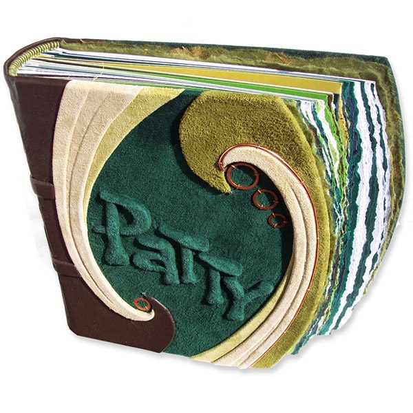 green leather photo album with name Patty within swirl leathers