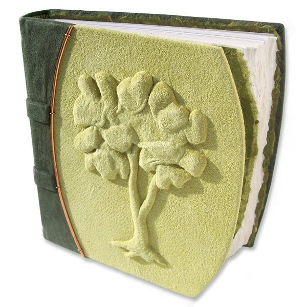 handcarved Embossed Tree Journal under suede lime green leather on blank nature themed journal