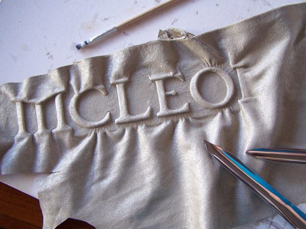 McLeod Name Plate carved and embossed under leather