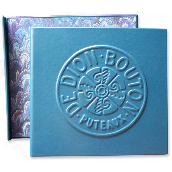 Antique classic car turquoise leather scrapbook with car logo De Dion Bouton embossed on the cover