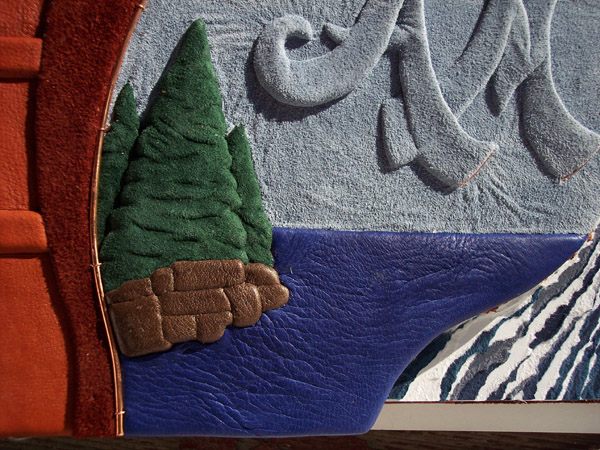 Leather landscape art of Lake superior in MN with trees, rocks, lake