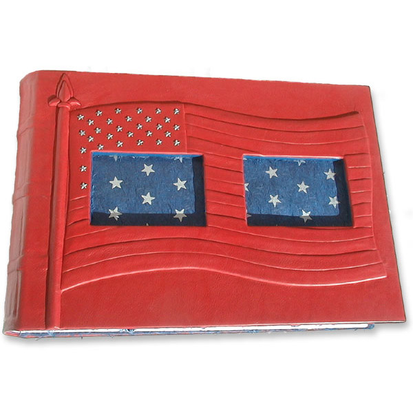 carved embossed USA flag on red leather photo album cover with two cutout windows, blue coversheets with silver stars
