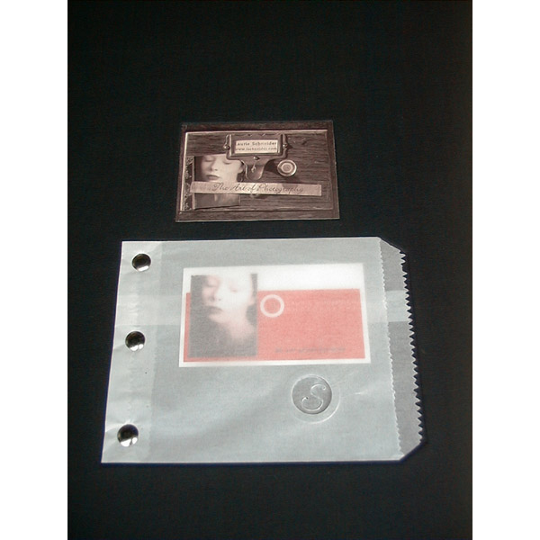 custom business card holder in portfolio, riveted bag with embossed business logo