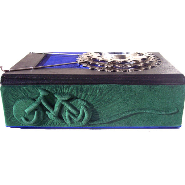 personalized leather clamshell box with carved bicycle, initials, and bicycle gears and spokes