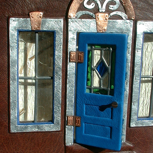Blue leather door and glass windows on leather book cover