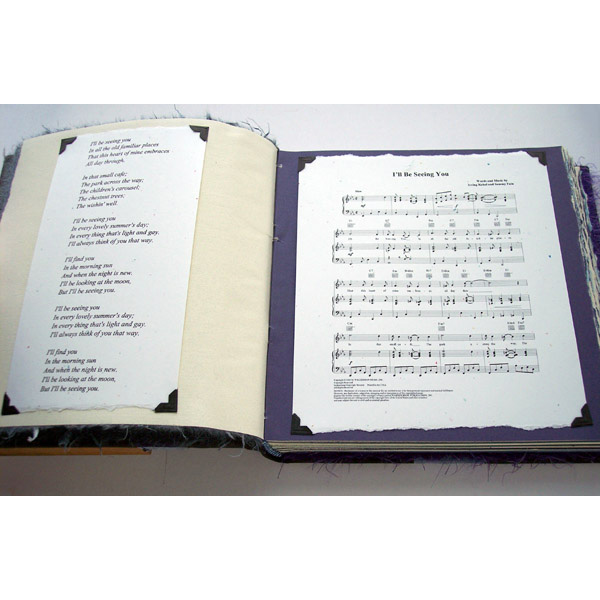 Custom leather sheet music book with sheetmusic on pages