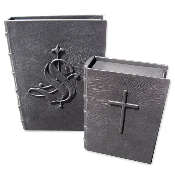 pair of black leather boxes with embossed cross and old english initial S