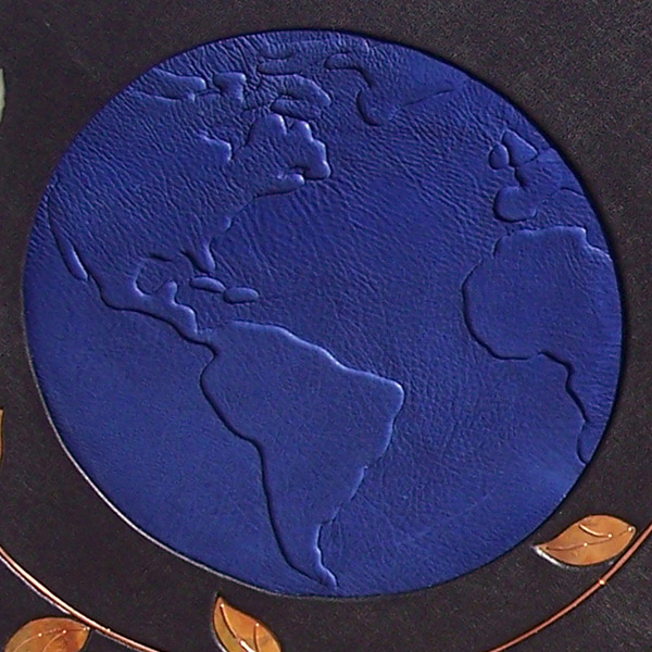 carved embossed blue leather earth on custom leather globe book cover