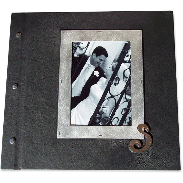 black leather screwpost wedding album with bride and groom photo framed under glass with copper initial S