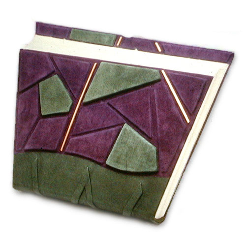 askew cut handbound book in purple and green leather with mosaic and copper
