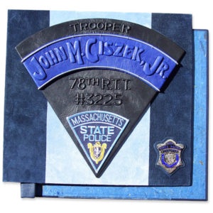 State Trooper Police Scrapbook with name embossed under blue leather, Massachusetts patch, Police badge