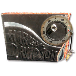 Harley-Davidson Motorcycle black leather scrapbook with clutch plate and sparkplug closure, embossed lettering, silver curve stripe