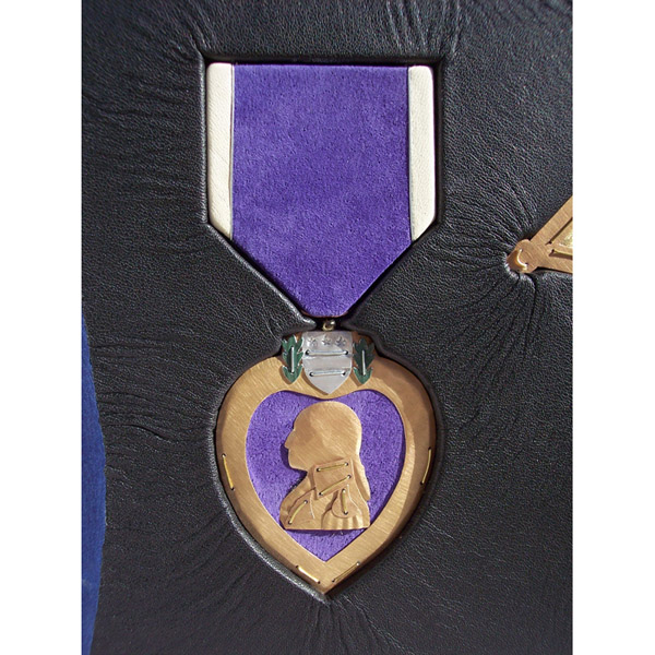 leather and metal sculpted Purple Heart artwork inset into leather Military award book cover
