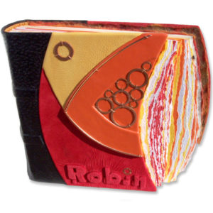 modern mosaic custom leather scrapbook with embossed name Robin in yellow, orange, red and copper washers, all curved edges