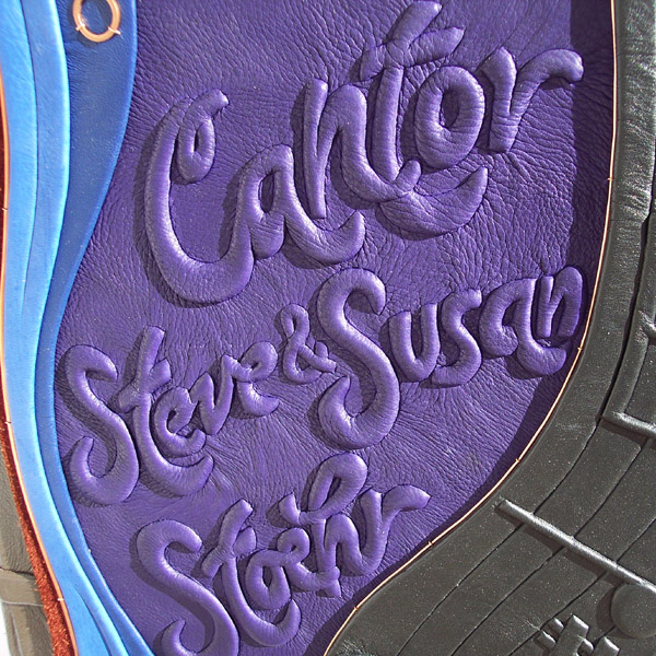 handcarved embossed lettering Cantor Steve and Susan Stoehr under purple leather on music book cover