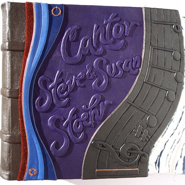 music staff and notes on personalized purple leather book cover for Cantor
