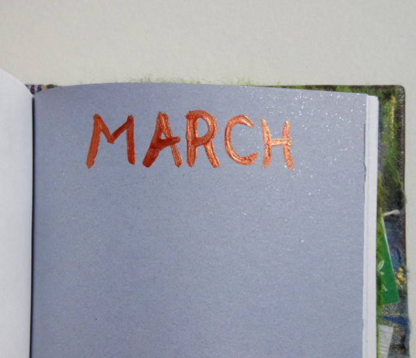 Handpainted month March in Copper Paint for birthdays on book page