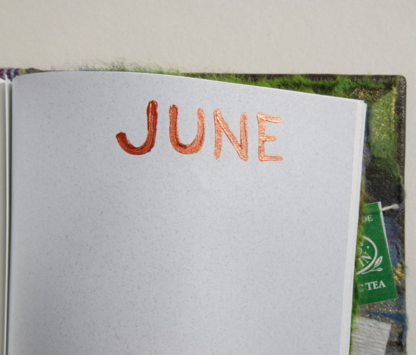 Handpainted month June in Copper Paint for birthdays on book page