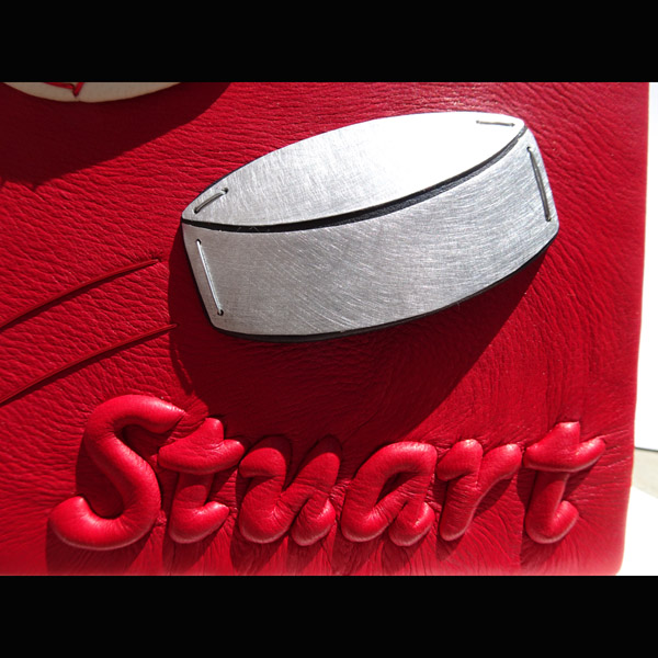 Silver Capped 3-D Hockey Puck on Book Cover, Red Leather Embossed Name Stuart